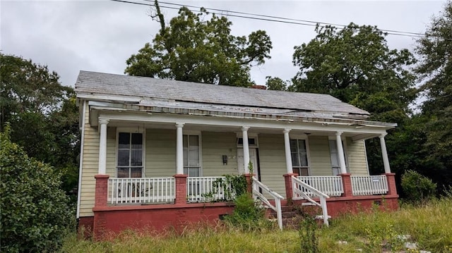 view of front of home featuring covered porch