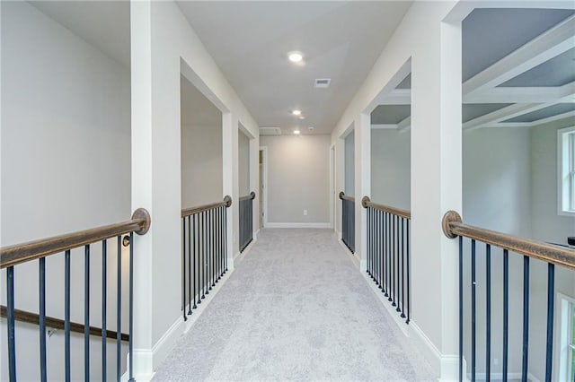 hall featuring carpet flooring, an upstairs landing, visible vents, baseboards, and recessed lighting