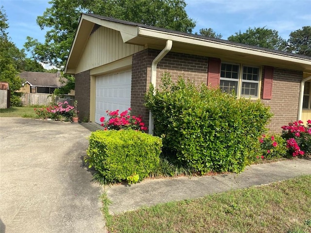 view of home's exterior featuring a garage