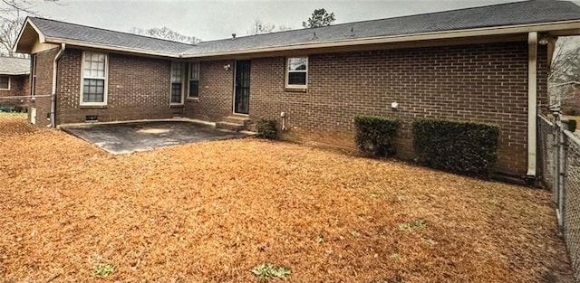 back of property featuring a patio