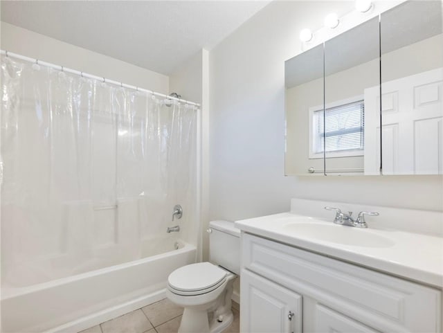 bathroom with tile patterned floors, vanity, toilet, and shower / tub combo with curtain