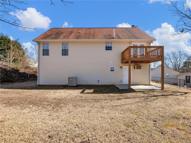 back of house featuring a patio, cooling unit, fence, a yard, and a deck