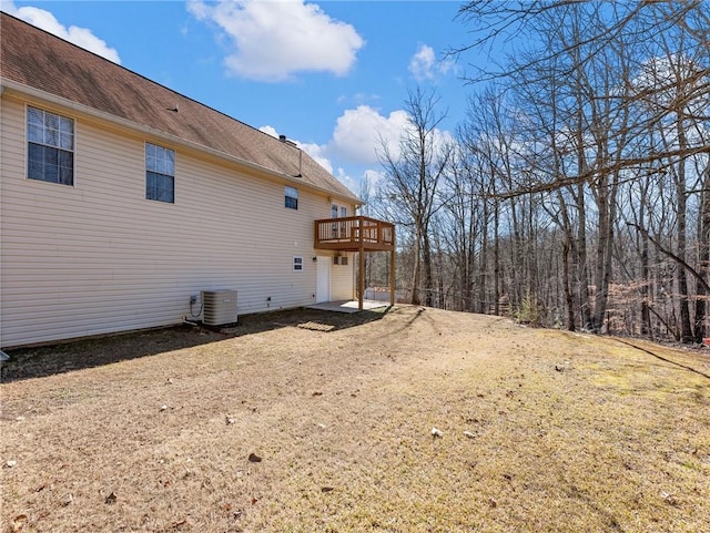 exterior space featuring a deck and central AC unit