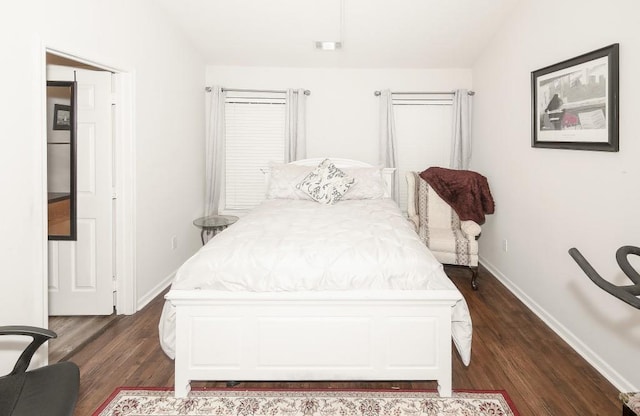 bedroom featuring dark hardwood / wood-style floors