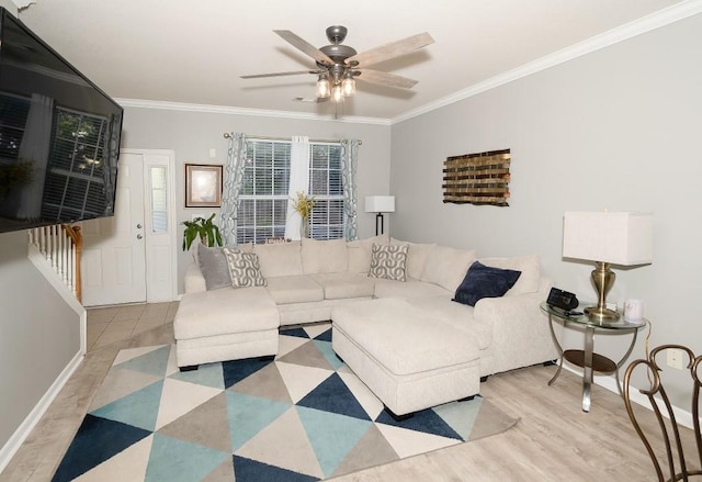 living room with ornamental molding, ceiling fan, and light hardwood / wood-style flooring