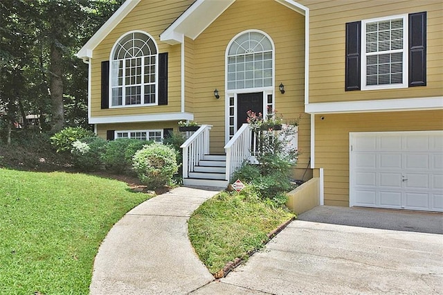 property entrance with a garage