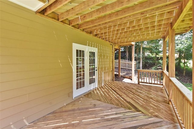 wooden terrace featuring french doors