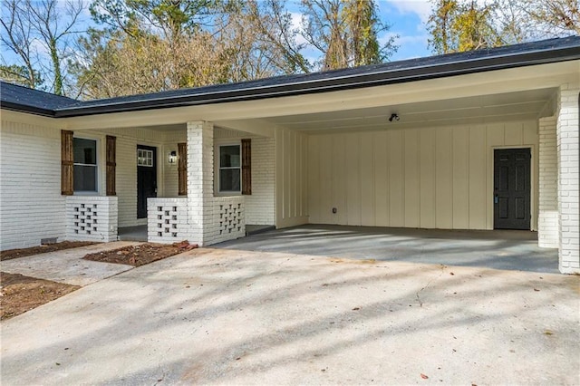 exterior space with a carport