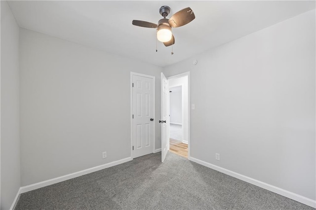 unfurnished room featuring carpet flooring and ceiling fan