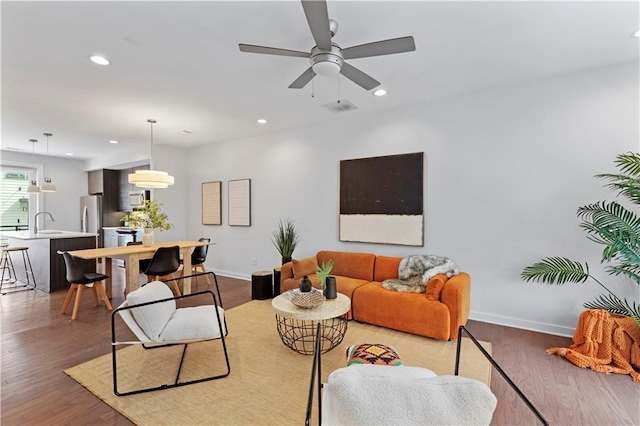 415 Gartrell St SE Unit 15, Atlanta, GA 30312 - living room featuring wood finished floors, recessed lighting, and a ceiling fan
