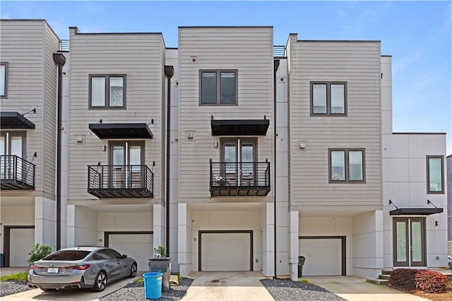 415 Gartrell St SE Unit 15, Atlanta, GA 30312 - view of property featuring a garage and driveway