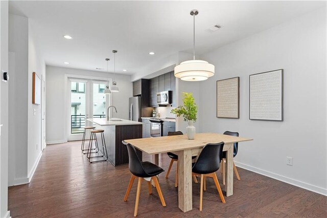 415 Gartrell St SE Unit 15, Atlanta, GA 30312 - dining space featuring dark wood-style flooring and recessed lighting