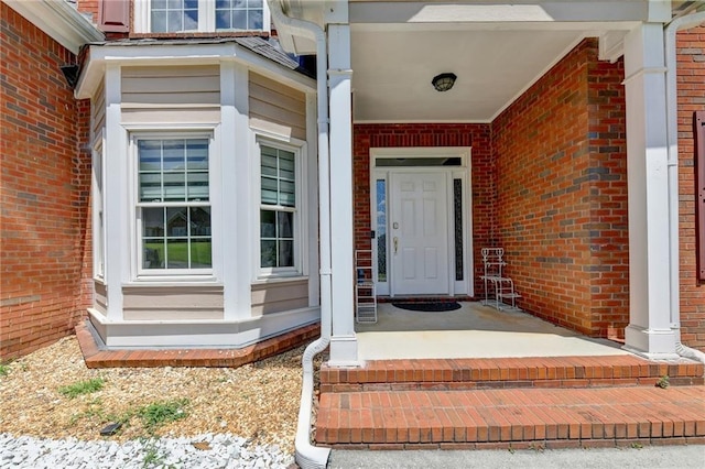 doorway to property with a porch