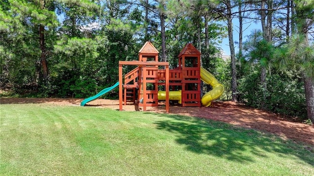 view of playground featuring a lawn