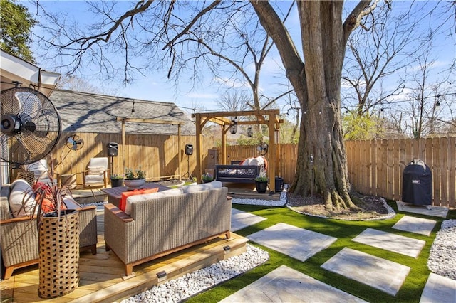 view of yard featuring a patio area, a fenced backyard, a pergola, and an outdoor hangout area