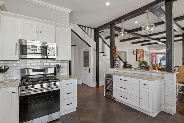 kitchen with beverage cooler, beam ceiling, recessed lighting, stainless steel appliances, and tasteful backsplash