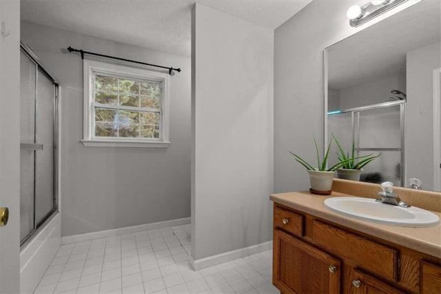 75 Mcpherson Ln, Bremen, GA 30110 - bathroom featuring vanity, tile patterned floors, a textured ceiling, and bath / shower combo with glass door