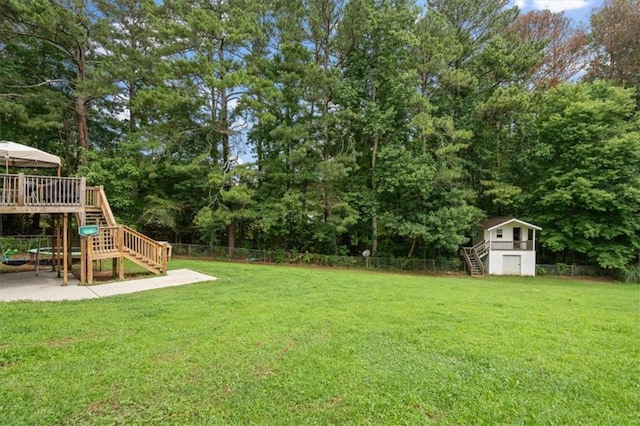 75 Mcpherson Ln, Bremen, GA 30110 - view of yard with stairs, a deck, and view of wooded area