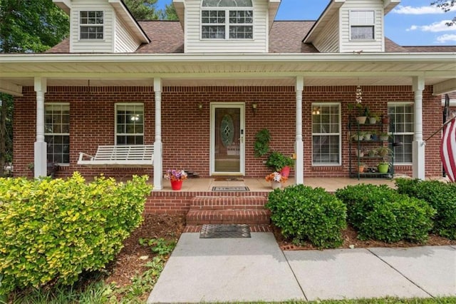 75 Mcpherson Ln, Bremen, GA 30110 - entrance to property with covered porch, brick siding, and roof with shingles