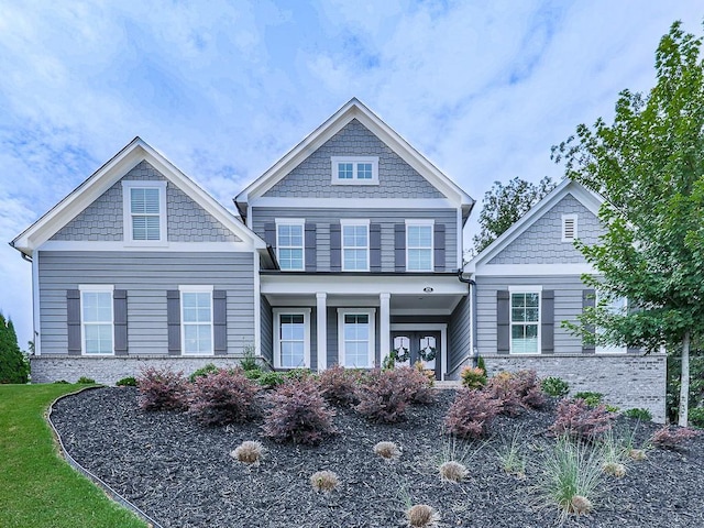 view of front of home featuring covered porch