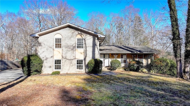 view of front of home with a front lawn