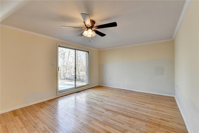 unfurnished room with crown molding, ceiling fan, and light wood-type flooring