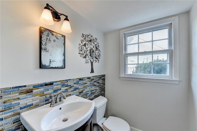 bathroom with sink and toilet