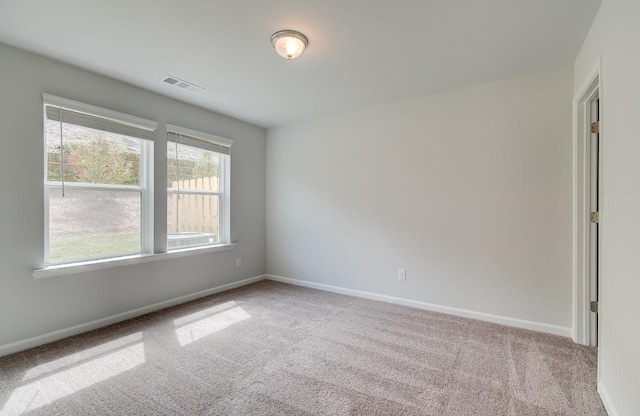 3151 Washburn St SW, Atlanta, GA 30354 - spare room featuring carpet flooring and baseboards