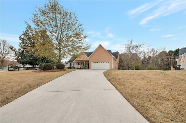 view of front facade with a front lawn and a garage