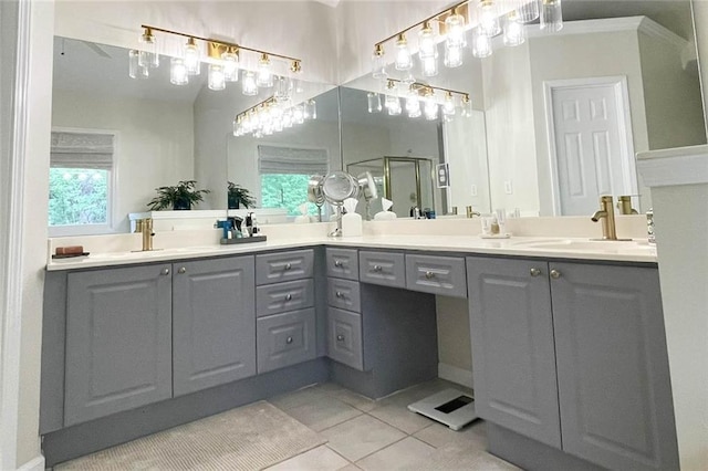 310 Hillpine Dr, Woodstock, GA 30189 - full bathroom with tile patterned floors, double vanity, and a shower stall