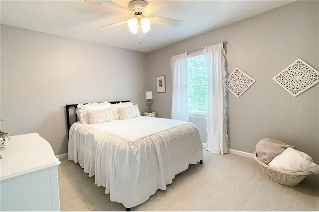 310 Hillpine Dr, Woodstock, GA 30189 - bedroom with light carpet, baseboards, and a ceiling fan