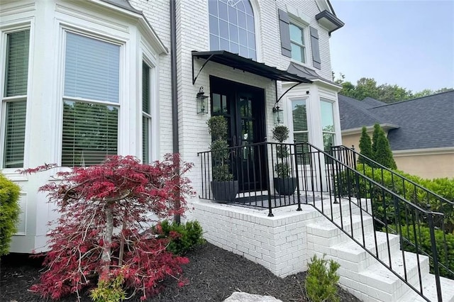 310 Hillpine Dr, Woodstock, GA 30189 - doorway to property featuring brick siding