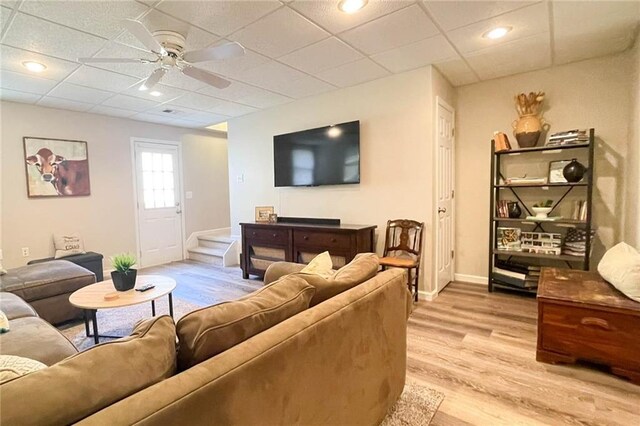 310 Hillpine Dr, Woodstock, GA 30189 - living room with wood finished floors, a ceiling fan, and a drop ceiling