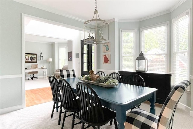 310 Hillpine Dr, Woodstock, GA 30189 - dining room with plenty of natural light, ornamental molding, baseboards, and light wood finished floors