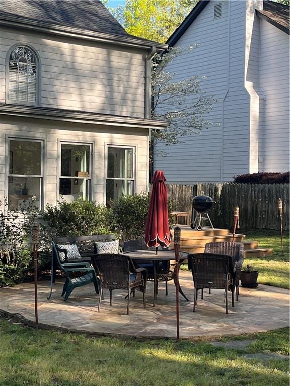 view of patio with fence