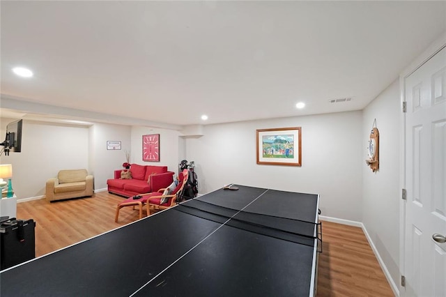 playroom with baseboards, recessed lighting, wood finished floors, and visible vents