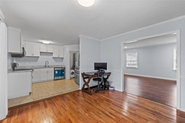 3626 Buford Hwy NE Unit C1, Brookhaven, GA 30329 - kitchen featuring dishwasher, a sink, light wood-style floors, white cabinetry, and electric stove