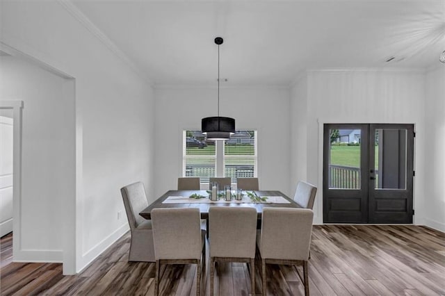 1021 Windsor Creek Dr, Madison, GA 30650 - dining area with ornamental molding, wood finished floors, and french doors