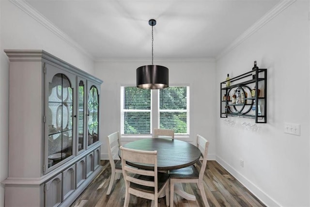 1021 Windsor Creek Dr, Madison, GA 30650 - dining space with dark wood finished floors and ornamental molding