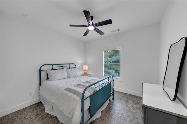 1021 Windsor Creek Dr, Madison, GA 30650 - carpeted bedroom featuring baseboards and a ceiling fan