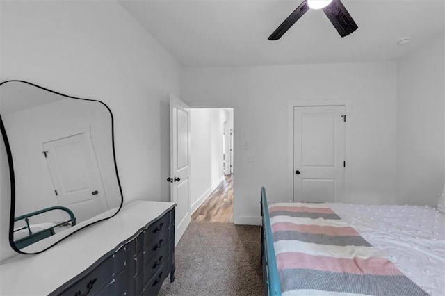 1021 Windsor Creek Dr, Madison, GA 30650 - bedroom with dark colored carpet and ceiling fan