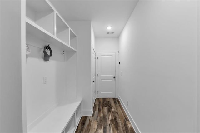 1021 Windsor Creek Dr, Madison, GA 30650 - mudroom with dark wood-style floors and baseboards