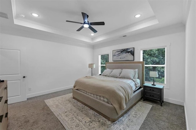 1021 Windsor Creek Dr, Madison, GA 30650 - carpeted bedroom featuring a raised ceiling, recessed lighting, crown molding, and a ceiling fan