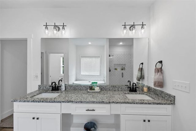 1021 Windsor Creek Dr, Madison, GA 30650 - full bath featuring a shower stall, double vanity, and a tub