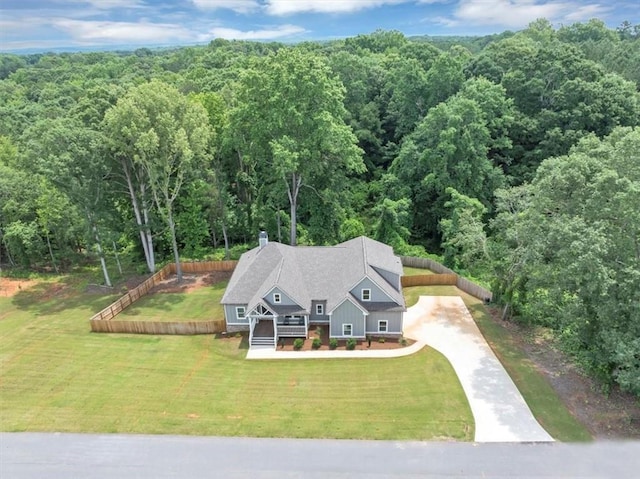 1021 Windsor Creek Dr, Madison, GA 30650 - view of subject property featuring a heavily wooded area