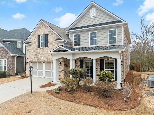 front facade with a garage and covered porch