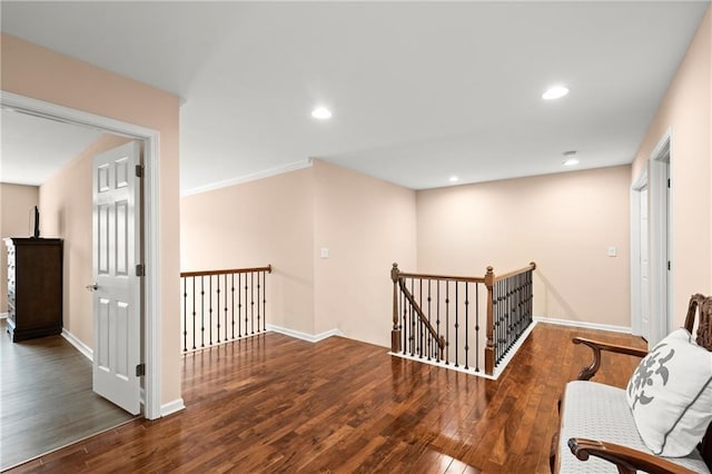 hallway with dark hardwood / wood-style floors