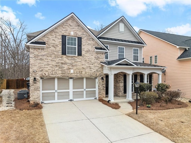 view of front property featuring a garage, central AC, and a porch