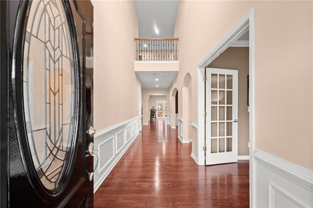 foyer featuring dark hardwood / wood-style floors