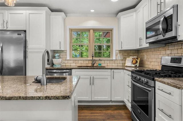 1630 Park Ln, Marietta, GA 30066 - kitchen with stainless steel appliances, a sink, stone countertops, white cabinetry, and recessed lighting